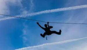 Flying man on a zip line